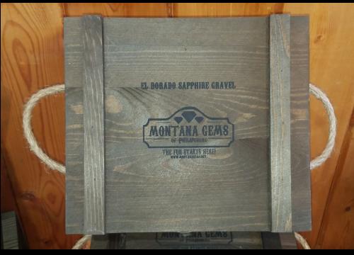 Montana Gems sapphire gravel with wooden gift box and mining supplies.