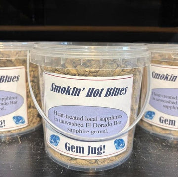 Container labeled 'Smokin' Hot Blues Gem Jug! Sapphire mining gravel