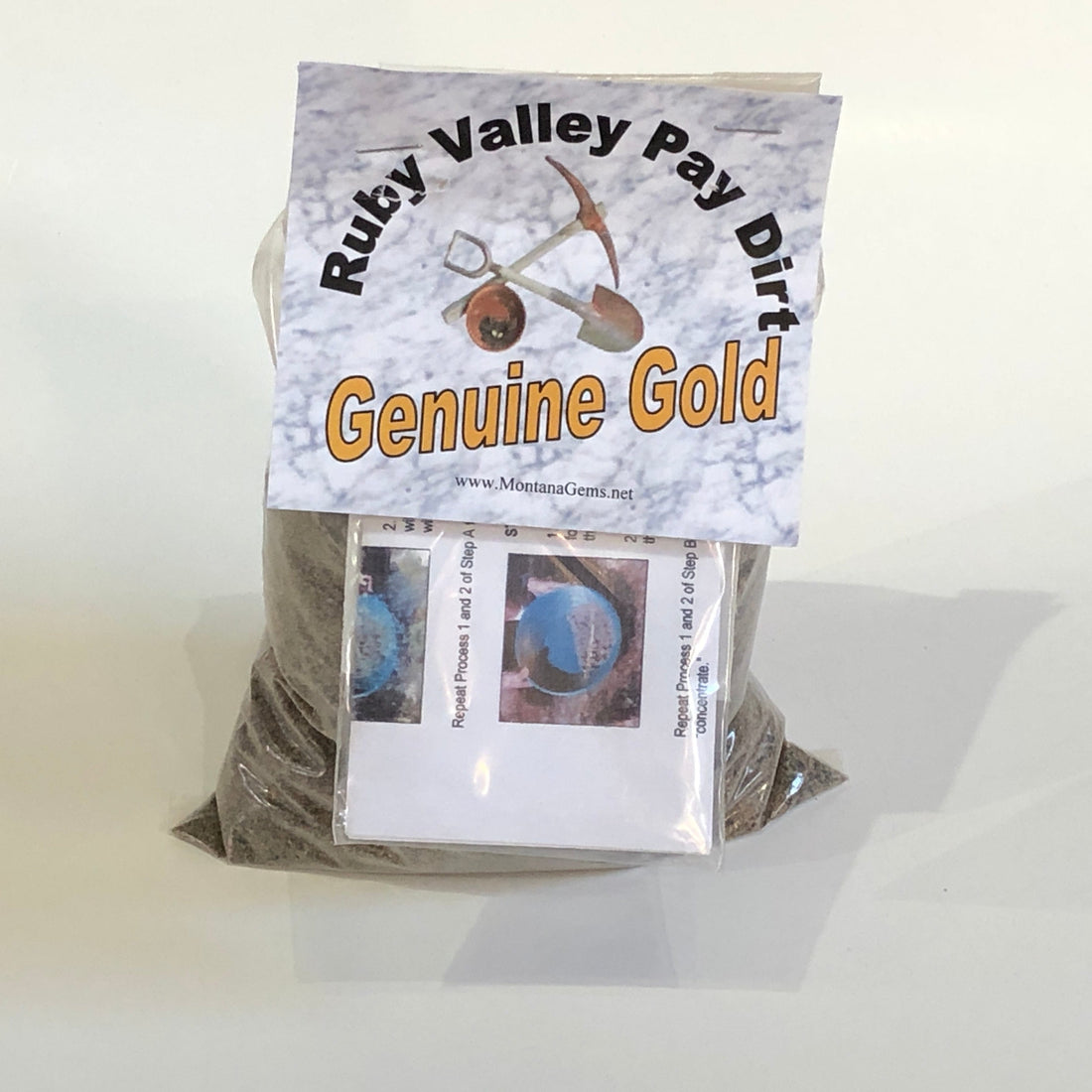 Logo for Ruby Valley Pay Dirt with a pickaxe and shovel icon on a white background.