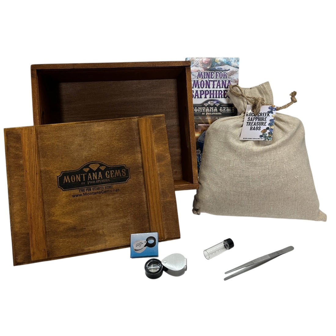 Montana Gems sapphire gravel with wooden gift box and mining supplies.